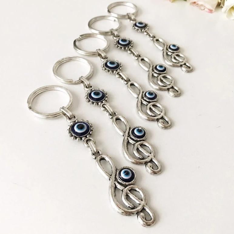 Evil eye treble clef keychain